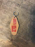 Warning Motel Keychain
