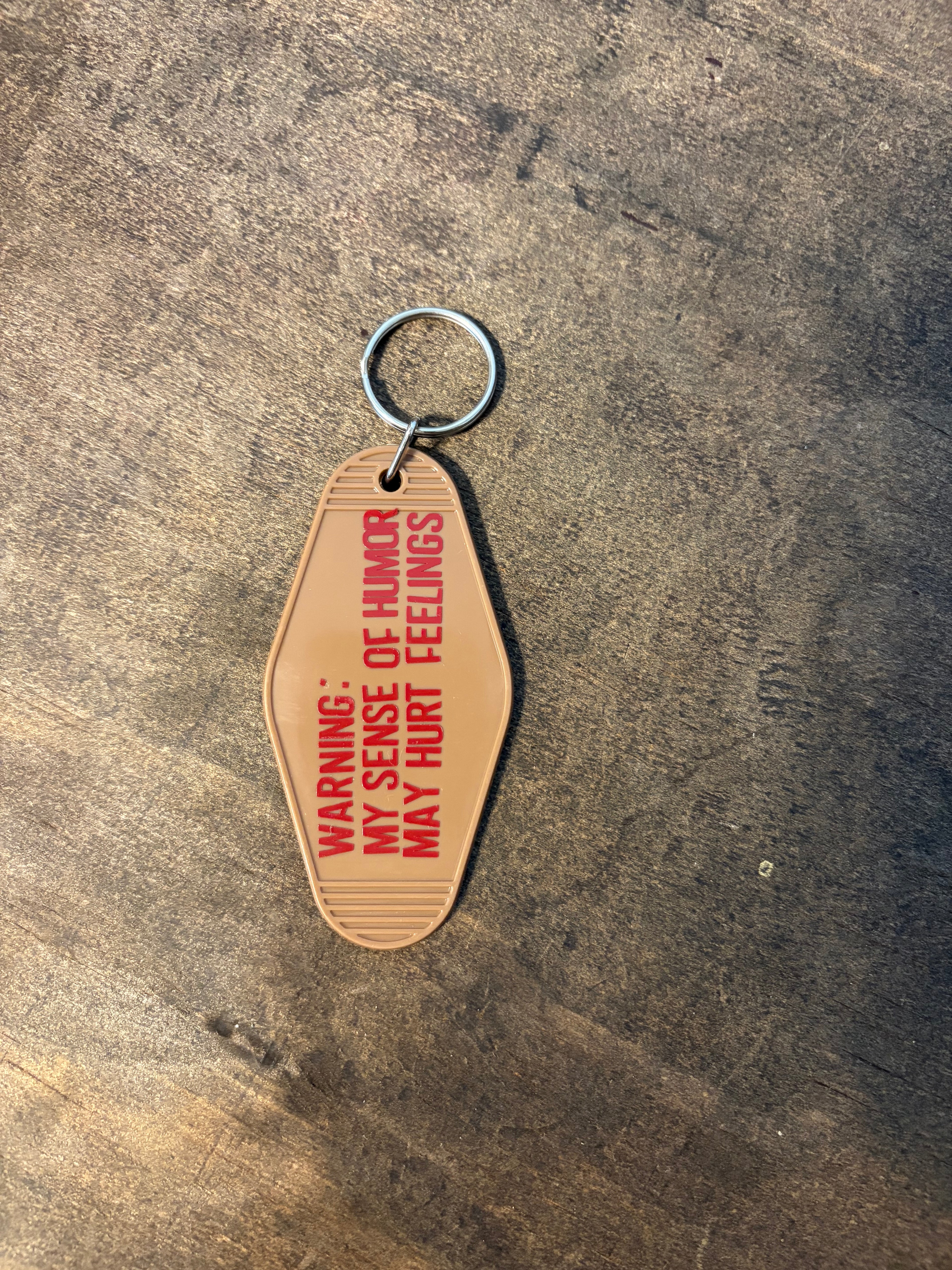 Warning Motel Keychain