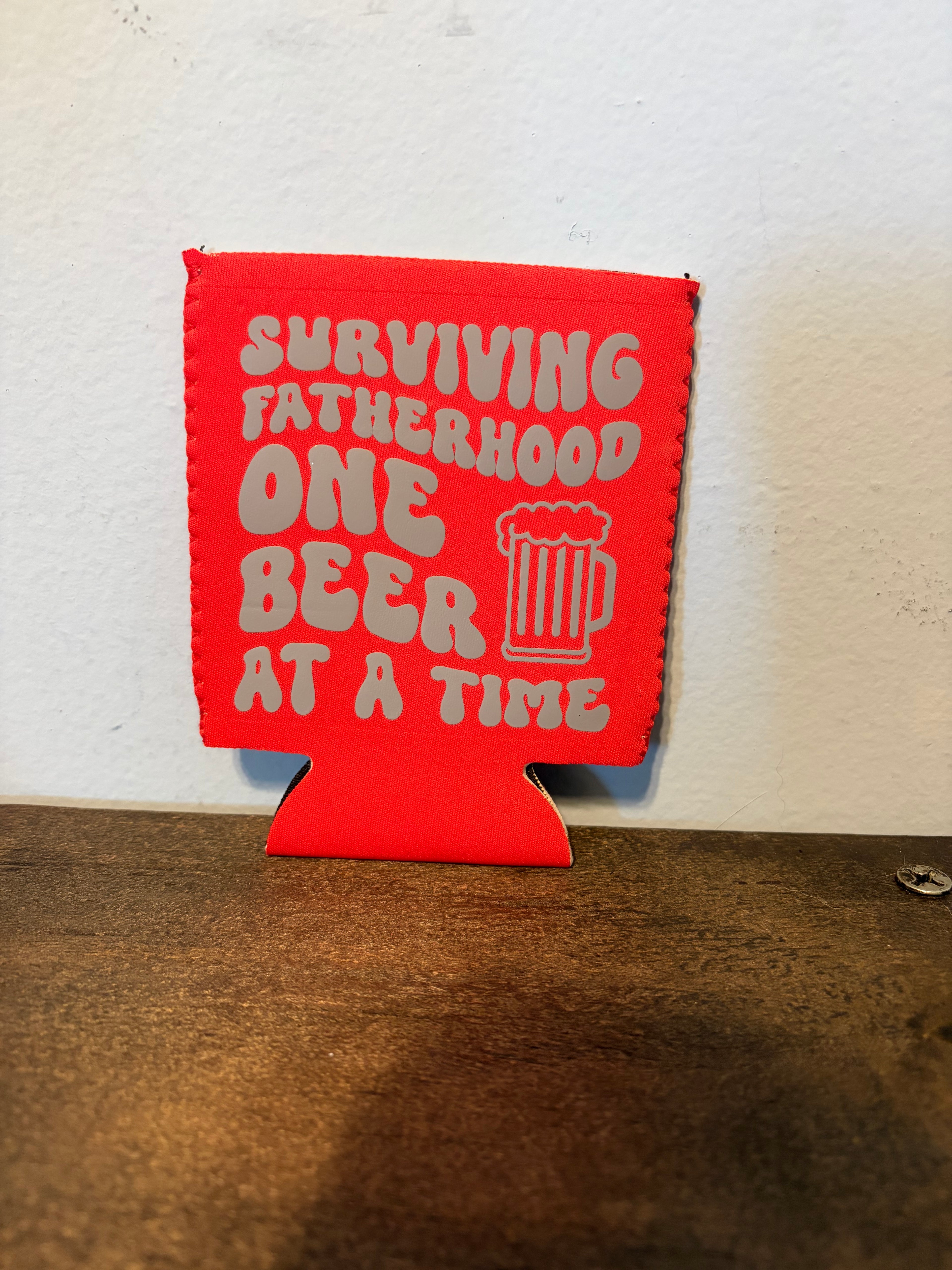 Surviving Fatherhood Koozie
