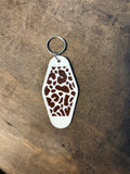Cow Print Motel Keychain